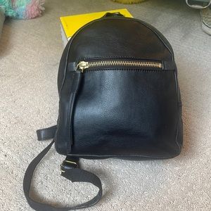 Black Fossil backpack purse.